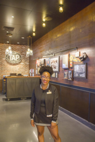 A greeter at the TAP Sports Bar and Grill at MGM Springfield
